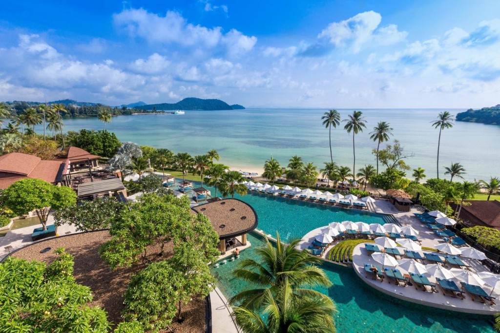 Luxury beachfront hotel pool area near Pattaya, a common stay hub for festival attendees