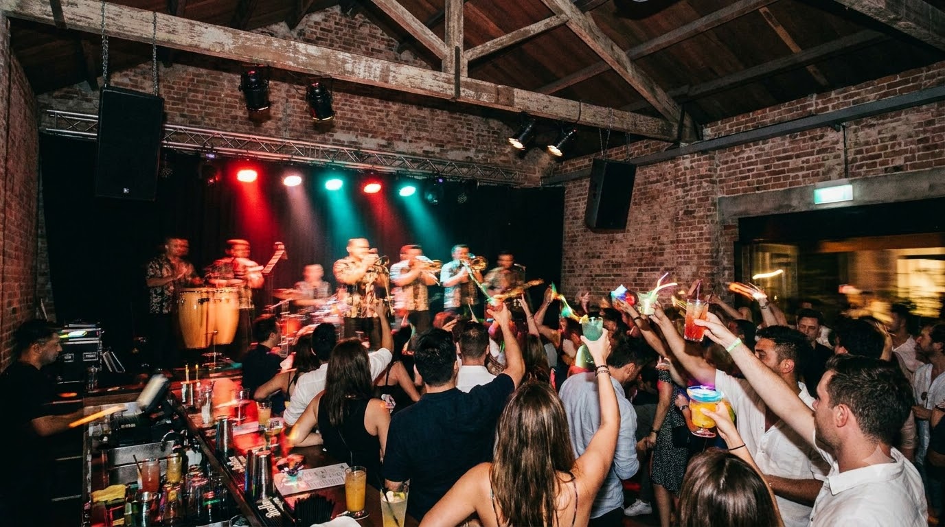 Live band performing to a crowd inside a converted warehouse music venue at Clarke Quay Live band performing to a crowd inside a converted warehouse music venue at Clarke Quay