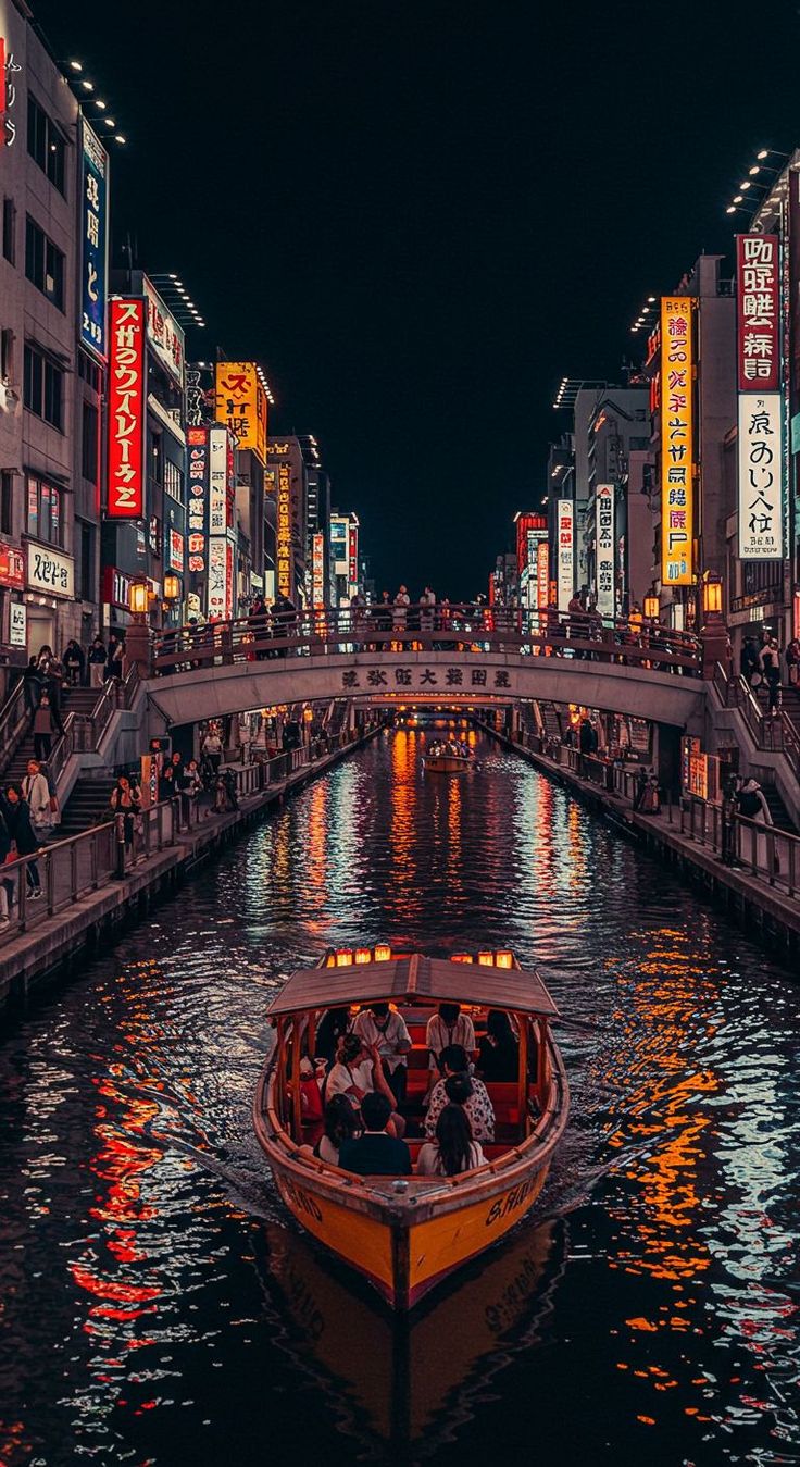Vibrant neon lights and street food canal at Dotonbori in Osaka Japan