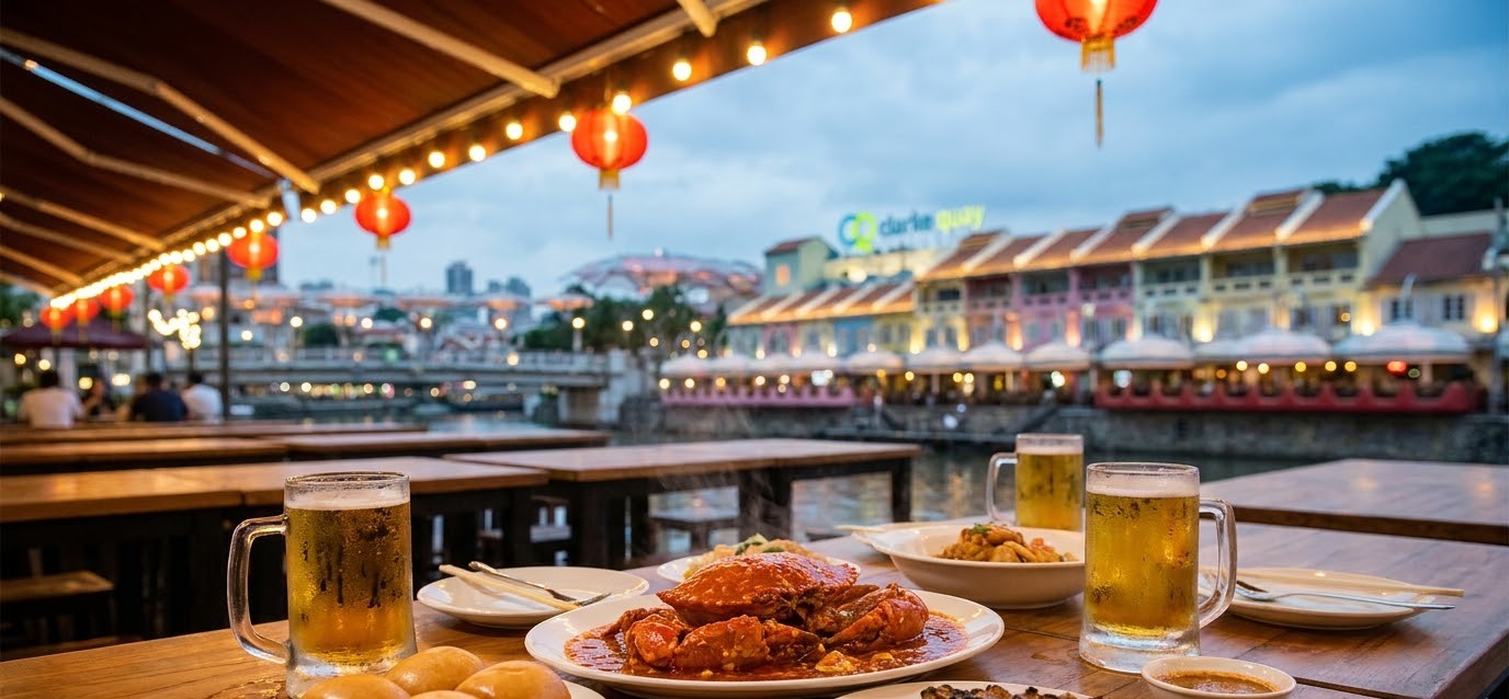 Singapore chilli crab with fried mantou buns on an outdoor riverside table at Clarke Quay in the evening Singapore chilli crab with fried mantou buns on an outdoor riverside table at Clarke Quay in the evening